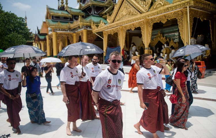 Tourists in longyi